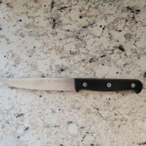 Henckels International 5" Stainless Steel Serrated Utility Knife With Black Hand